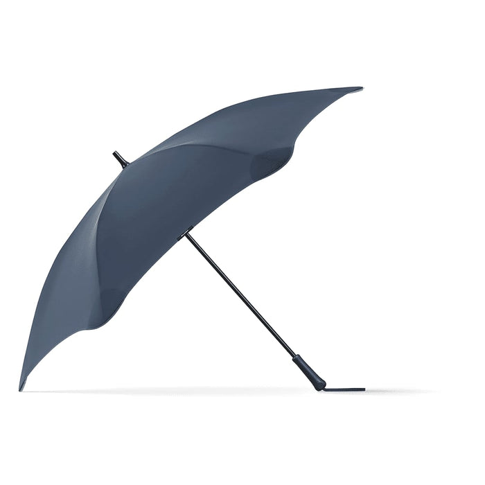 BLUNT Exec Umbrella - A navy blue umbrella with a sleek design and a curved canopy, featuring a black handle and an understated logo.