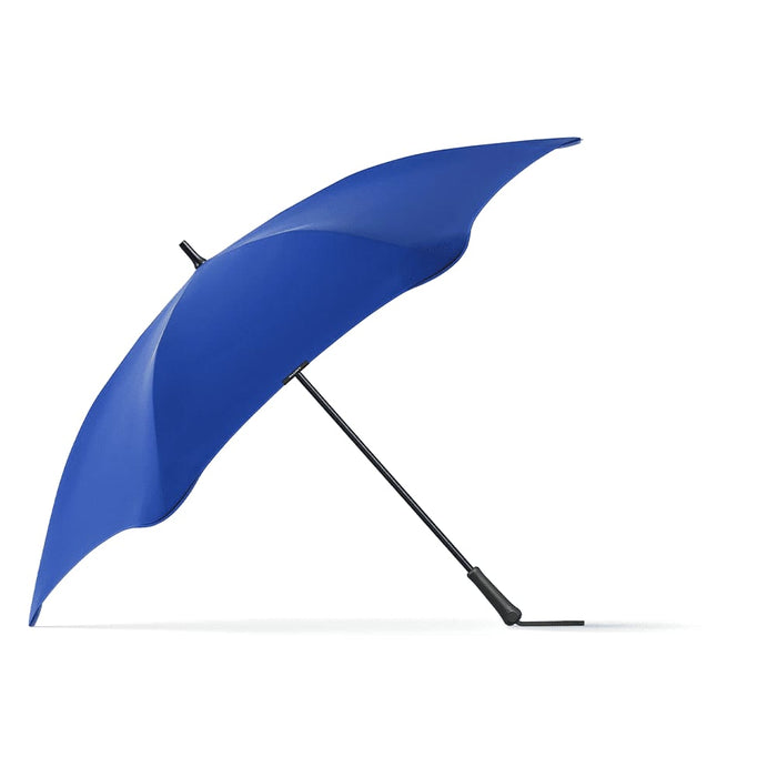 BLUNT Exec Umbrella - A blue umbrella with a sleek design, featuring a curved canopy and a black handle.