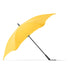 BLUNT Exec Umbrella - A yellow umbrella with a black handle and pole, featuring a sleek design and a branding logo.