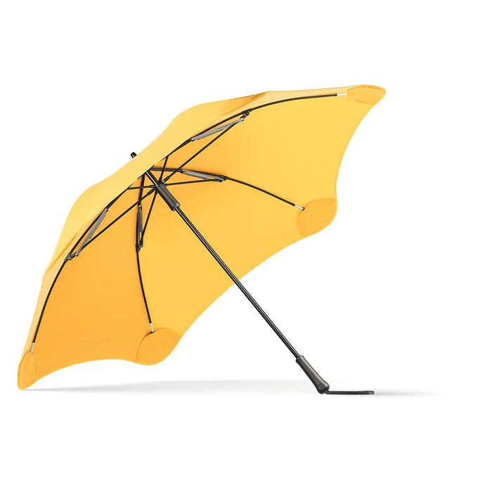 BLUNT Exec Umbrella - A yellow umbrella with a sleek design and a sturdy black frame, featuring a branding logo.
