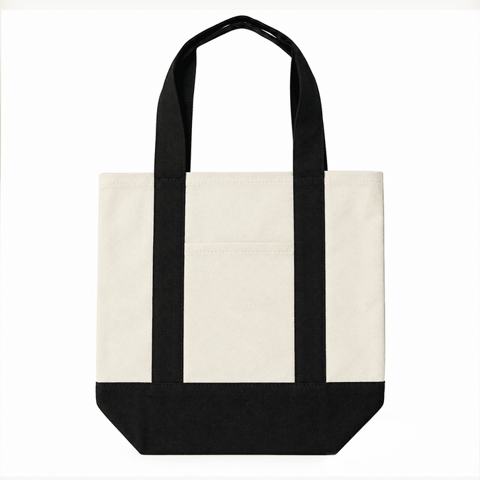 Mini Canvas Tote - A mini canvas tote in cream with black straps and a reinforced bottom, featuring a logo.