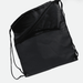 The Buddy Drawstring Bag - A black drawstring bag with a zippered pocket and adjustable shoulder straps. It features a simple design and has a logo.