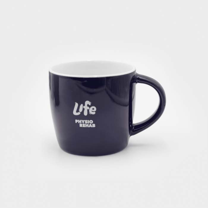 The Maxwell 330ml Ceramic Mug - A ceramic mug in navy blue with a white interior and a curved handle, featuring a logo on the side.
