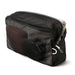 Bellroy Lite Packing Cube 6L - A black mesh packing cube containing various items, showcasing its organisational features and content visibility.