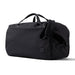 Bellroy Classic Duffel 45L - A black duffel bag with handles and an adjustable strap, featuring a small logo on the side.