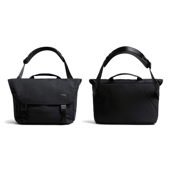 Bellroy Classic Messenger 13L - A black messenger bag with adjustable strap, featuring a flap closure and carry handles, along with a subtle logo.