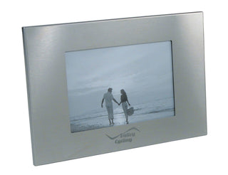 Milan Photo Frame, Single - A silver photo frame with a rectangular shape, featuring a central opening for a photo and a logo on the bottom.