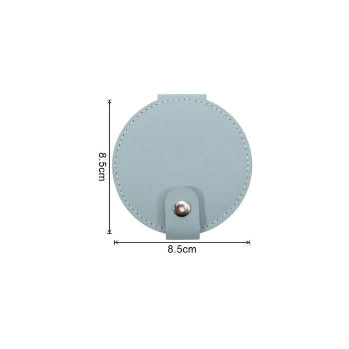 Round Folding Pocket Mirror - A round folding pocket mirror in light blue with a snap closure, measuring 8.5 cm in diameter. It features a logo.