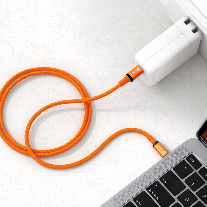 100W Magnetic Flat Braided Charging Cable - An orange 100W magnetic flat braided charging cable connected to a white charger and a laptop.
