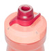 CamelBak Podium Bike Bottle 0.6L - Retail Colours - A drink bottle in shades of pink with a red spout and cap, featuring a logo.
