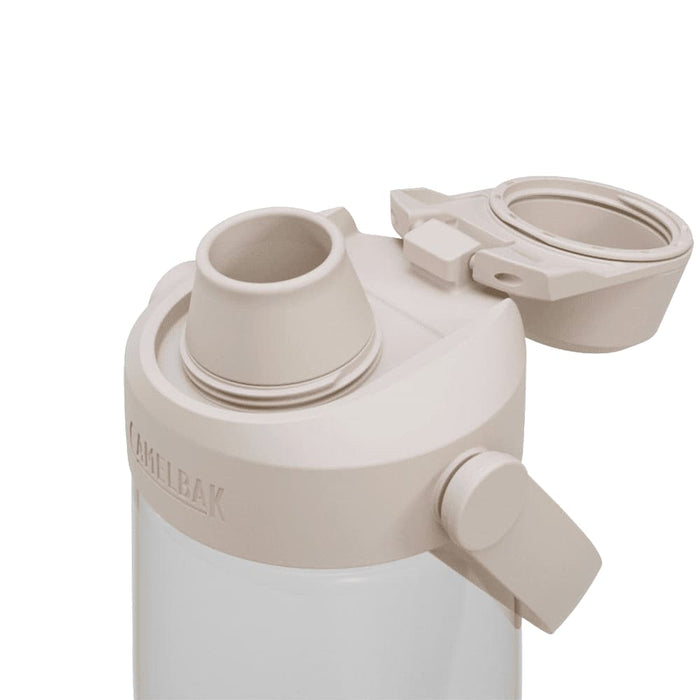 CamelBak - Thrive Chug 0.75L - A drink bottle with a beige lid and a clear body, featuring a spout and a removable cap. It has a logo.