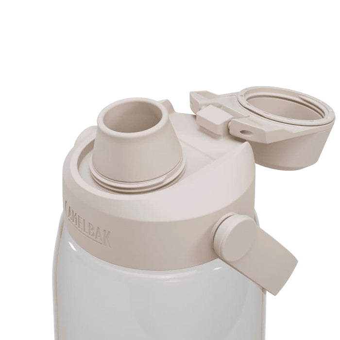 CamelBak - Thrive Chug 1.0L - A drink bottle in pale beige with a wide mouth and a spout, featuring a lid with a handle and a logo.