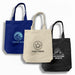 450gsm Hawaiian Canvas Tote Bag - A navy blue tote bag with a wave logo, a natural canvas bag with a coffee design, and a black bag with a mountain logo.
