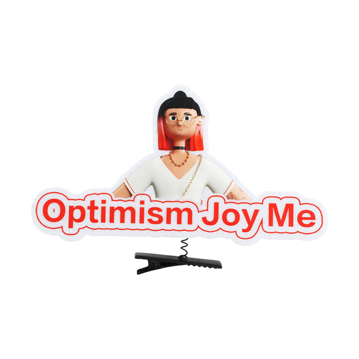 Custom Felt Spring Hair Clip - A custom felt hair clip featuring a character with red hair and the phrase "Optimism Joy Me" in bold text.
