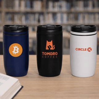 The Roamer 300ml Vacuum Cup - A drink bottle set featuring a navy blue, black, and white vacuum cup, each with a logo.