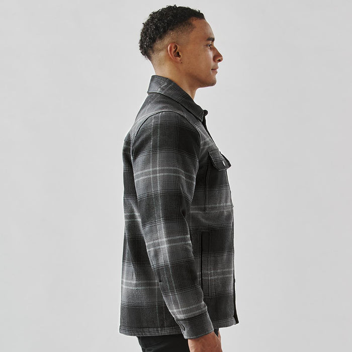Men's Highland Sherpa Lined Plaid Jacket - A men's plaid jacket in black and grey with a Sherpa lining, featuring a front pocket and a classic collar.