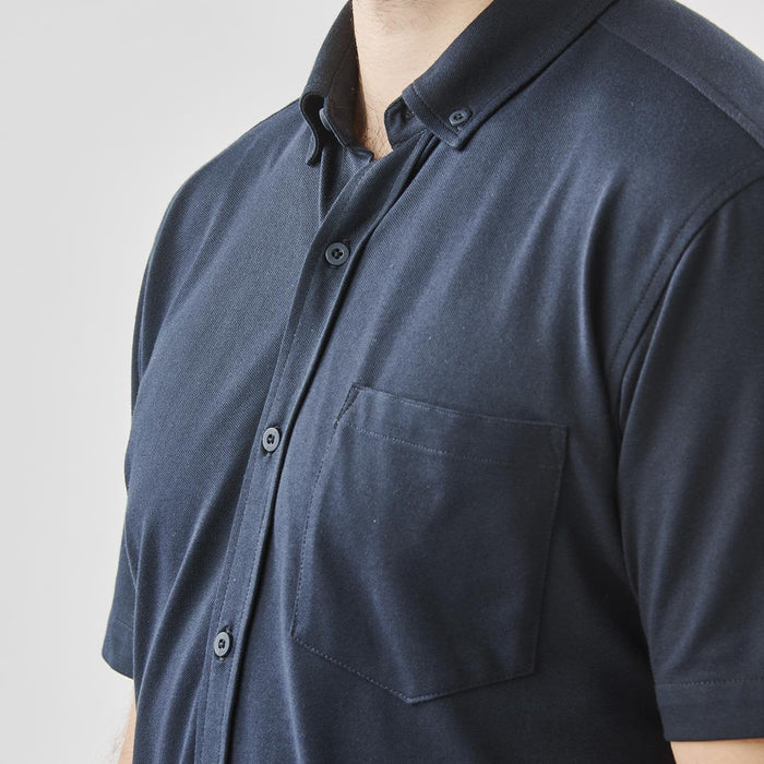 Men's Sonora Short Sleeve Knit Shirt - A navy short sleeve button-up shirt featuring a chest pocket and a logo.