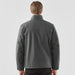Men's Athabasca Thermal Jacket - A men's thermal jacket in dark grey, featuring a classic collar and a back view. It includes a logo.