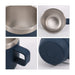 Stackable Stainless Steel Mug - A stackable stainless steel mug in navy blue with a sleek silver rim and a handle. The interior is polished stainless steel.