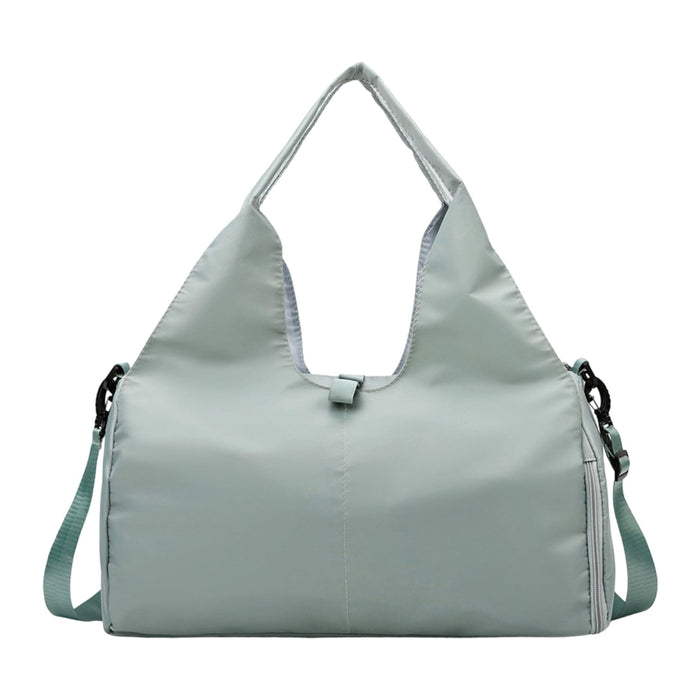 Duffle Bag With Yoga Mat Strap - A light green duffle bag with a yoga mat strap, featuring a logo and adjustable shoulder strap.