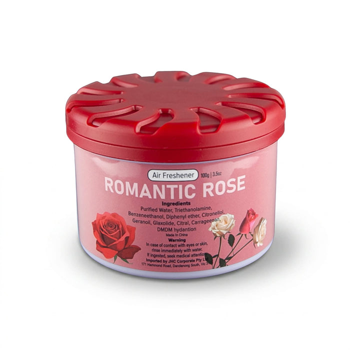 Air Freshener – Rose - A round container of air freshener with a pink label featuring red and white roses and a red lid.