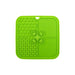 4-Section Dog Enrichment Lick Mat - A green, four-section dog enrichment lick mat featuring various textured patterns, including bones and paw prints.