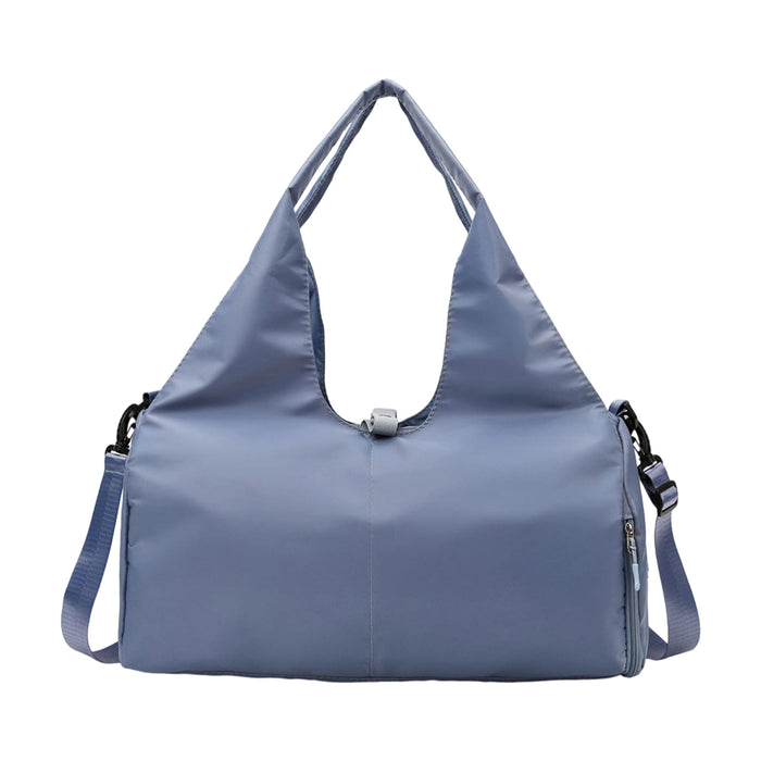 Duffle Bag With Yoga Mat Strap - A blue duffle bag with a yoga mat strap, featuring two carrying handles and a detachable shoulder strap.