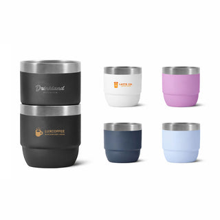 Stackable Stainless Steel Tumbler - A stackable stainless steel tumbler set in black, white, pink, navy, and light blue with logos on some tumblers.