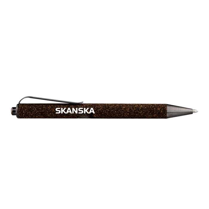 Coffee Grounds Pen - A brown pen with a textured surface, featuring a clip and a logo.