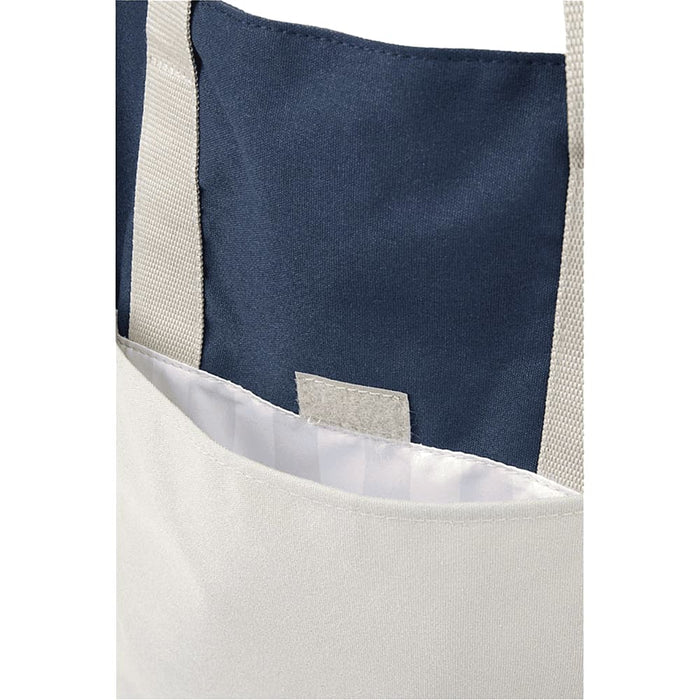 Field & Co.® Parks Day Tote - A beige tote bag with navy accents, featuring a simple design and a grey label inside the pocket.