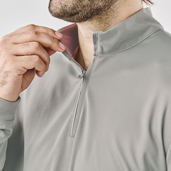Men's Monterey 1/4 Zip Pullover - A light grey men's pullover featuring a quarter zip and a subtly contrasting inner collar. It has a logo.