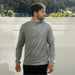 Men's Monterey 1/4 Zip Pullover - A grey men's pullover with a quarter zip, featuring long sleeves and a logo on the side.
