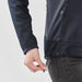 Women's Appaloosa Knit Jacket - A close-up of a woman's hand adjusting the drawstring of a navy knit jacket with a zipper pocket.