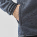 Men's Yosemite Full Zip Fleece Jacket - A grey polar fleece jacket featuring a side pocket and a fitted design at the cuffs. It has a logo on the hem.