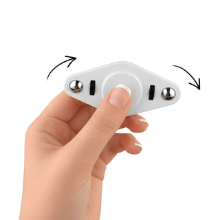 Vibro Fidget Spinner - A white Vibro Fidget Spinner held in a person's hand, featuring rotating elements on either side.