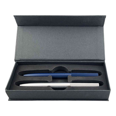 Valorias Elite Pen Gift Set - A gift box containing two metal pens, one silver and one blue, in a padded interior.