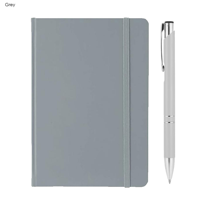 Alison A5 Notebook and Pen Gift Set - A grey A5 notebook with a matching elastic band and a silver pen beside it. The notebook features a logo on the cover.