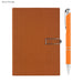 Century Noteook and Pen Gift Set - A brown notebook with an orange pen beside it, featuring a clasp closure and a textured cover.