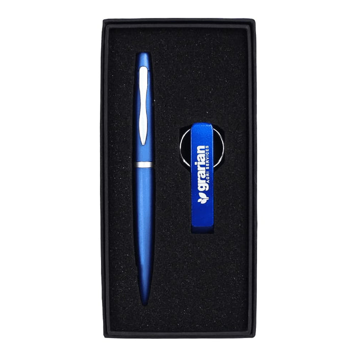 Chicago Pen & Bottle Opener Keyring Gift Set - A blue pen and blue bottle opener keyring set presented in a sleek black gift box with a logo.
