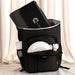 Picnic Pack - A black picnic backpack with a grey blanket, plates, cutlery, and a drink bottle in external pockets.
