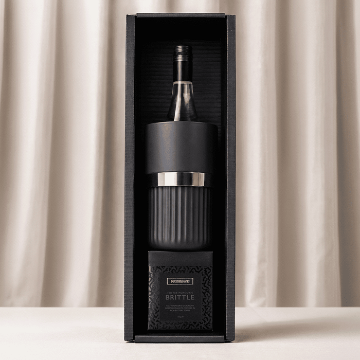 The Entertainer Set - A black gift box containing a wine bottle and a glass, with a branded logo on the packaging.