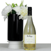 The Entertainer Set - A bottle of white Sauvignon Blanc wine beside a black vase with white flowers. The bottle has a label and branding.