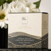 The Blunt Umbrella All Weather Set - A box of organic pure leaf tea with a white and gold design, containing eight brew pyramids. It has a logo on the front.
