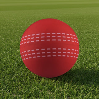 High Bounce Cricket Ball - A red cricket ball with white stitching details resting on green grass. The ball features a logo.