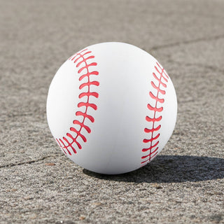 High Bounce Base Ball - A high bounce baseball in white with red stitching, resting on a grey surface. The product has a logo.