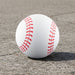 High Bounce Base Ball - A high bounce baseball in white with red stitching, resting on a grey surface. The product has a logo.