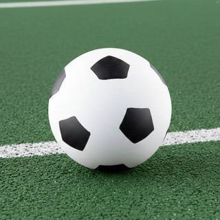 High Bounce Soccer Ball - A high bounce soccer ball featuring a classic black and white design, resting on a green surface.