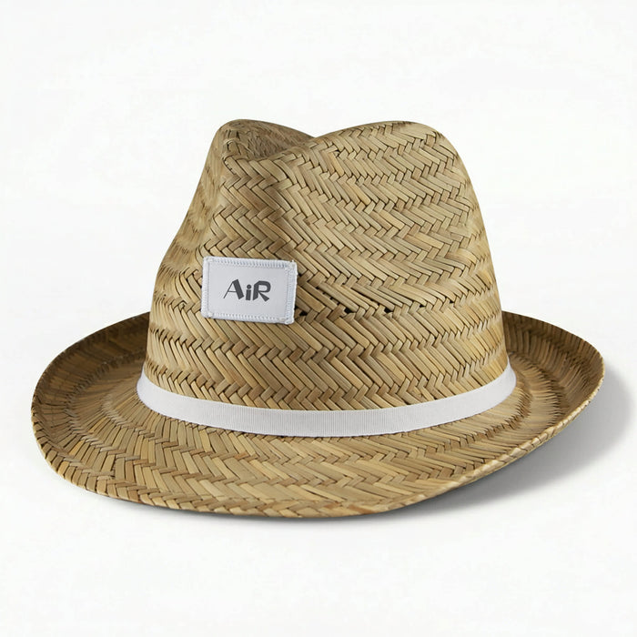 Panama Straw Hat - A Panama straw hat in natural tan with a white band and a logo on the side.