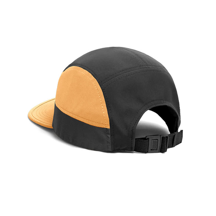 8-Panel Soft Peak Cap - A black and orange 8-panel cap with a curved brim and adjustable strap at the back, featuring a logo.