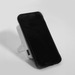 The Mellany 15W Wireless Charging Powerbank 10,000mAh - A wireless charging power bank in white, featuring a stand and a black face. It has a logo on the side.